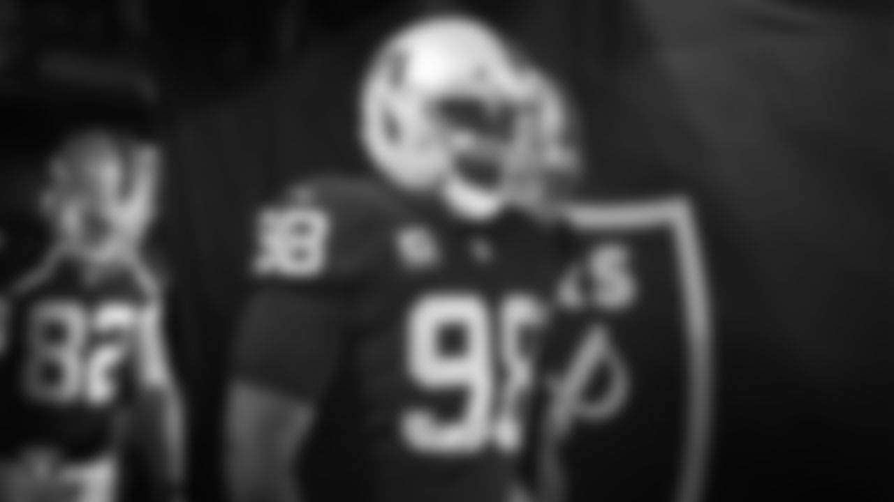 Oakland Raiders defensive tackle Frostee Rucker (98) waits to be introduced onto the field before the Oakland Raiders regular season game against the Denver Broncos at Oakland-Alameda County Coliseum, Monday, December 24, 2018, in Oakland, California. The Oakland Raiders won 24-17.