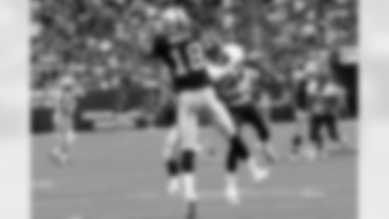 Rookie WR Louis Murphy (18) reaches up and makes a nice catch.