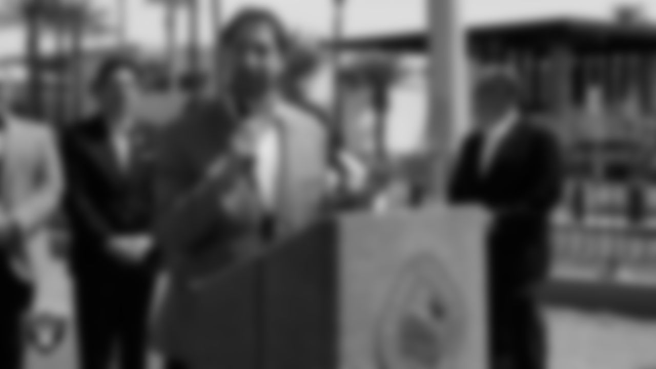 Clark County commissioner Michael Naft speaks during a ceremony before turning the lights of the "Welcome to Fabulous Las Vegas" sign silver and black.