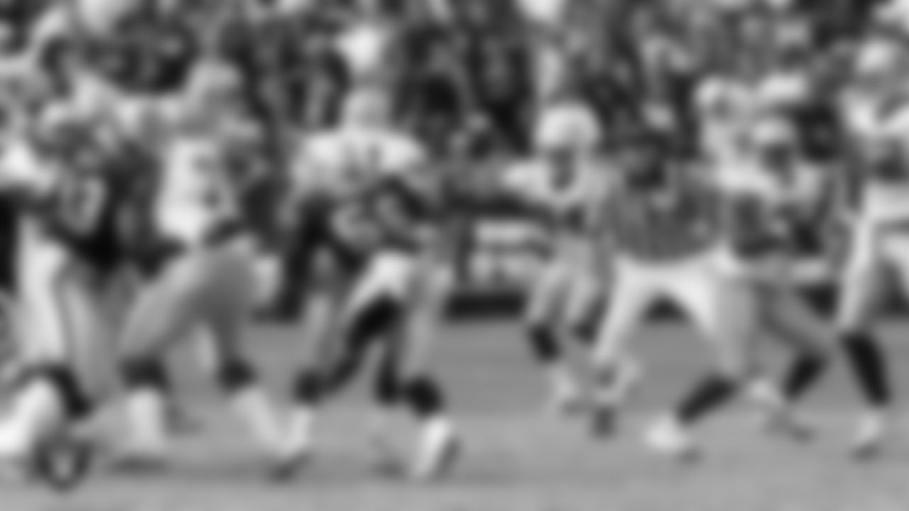 Oakland Raiders defensive end Derrick Burgess (56) sacks the quarterback during the regular season home game against the Dallas Cowboys at McAfee Coliseum, Sunday, October 2, 2005, in Oakland, Calif.