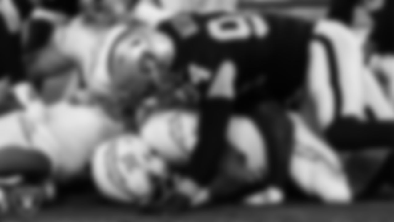 Las Vegas Raiders defensive end Carl Nassib (94) makes a tackle during the regular season home game against the Los Angeles Chargers at Allegiant Stadium, Thursday, December 17, 2020, in Las Vegas, Nev.