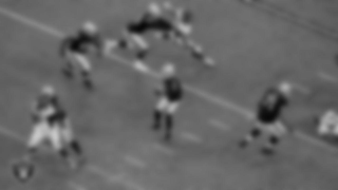 Las Vegas Raiders center Rodney Hudson (61)m guard Gabe Jackson (66), tackle Sam Young (70), quarterback Derek Carr (4) and tackle Denzelle Good (71) during the regular season game against the Denver Broncos at Allegiant Stadium.