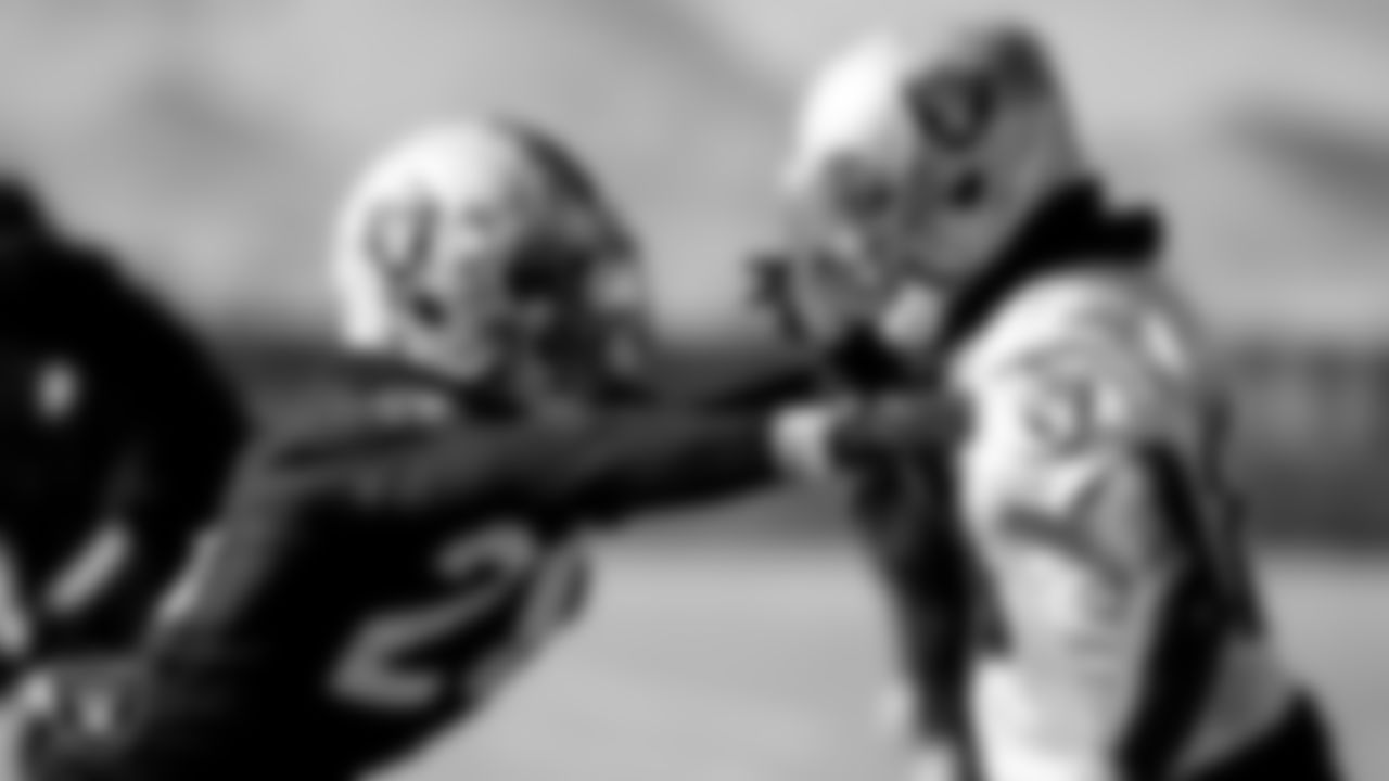 Las Vegas Raiders cornerback Nevin Lawson (26) and wide receiver Rico Gafford (10) during practice.
