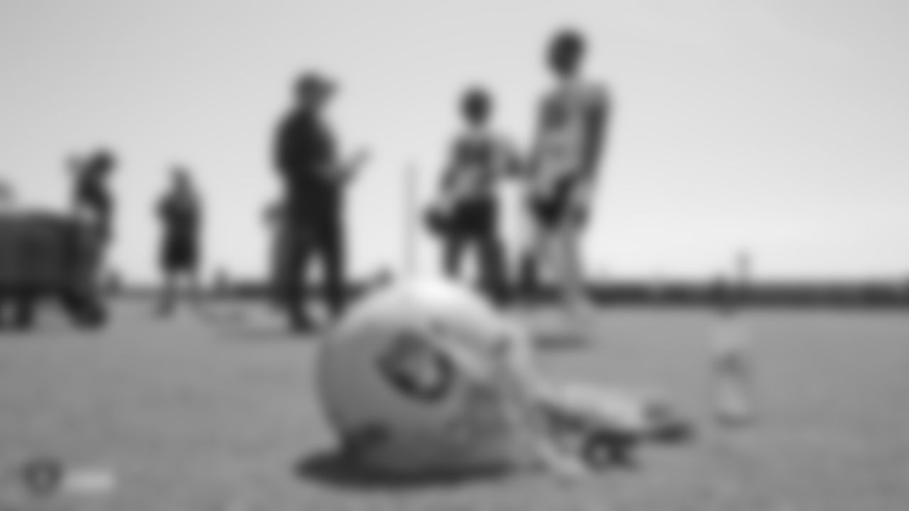 Raiders head coach Jon Gruden, wide receiver Antonio Brown (84), and wide receiver Tyrell Williams (16) at an Organized Team Activity (OTA) at the Raiders Practice Facility in Alameda, Calif.