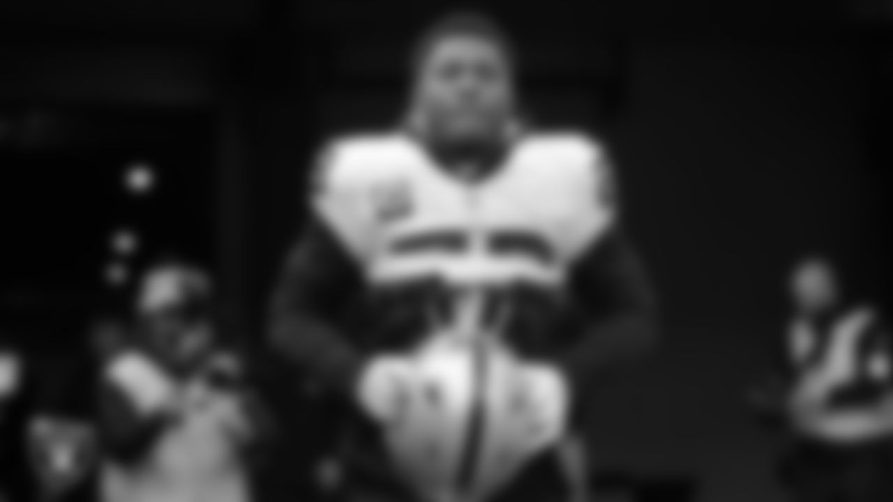 Las Vegas Raiders running back Josh Jacobs (28) walks down the tunnel before the postseason away game against the Cincinnati Bengals.