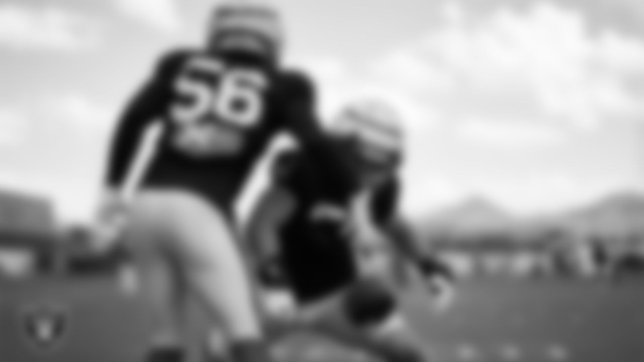 Las Vegas Raiders linebacker Amari Burney (56) and linebacker Luke Masterson (59) during practice at Intermountain Health Performance Center.