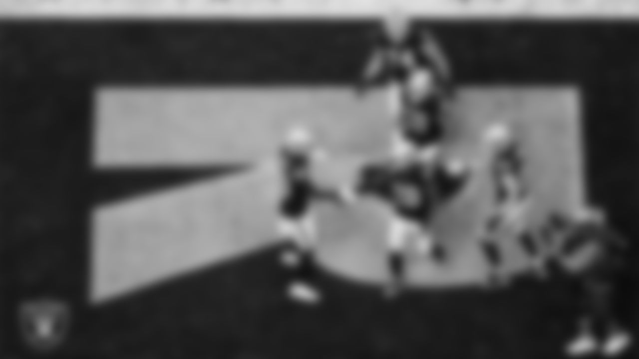 Las Vegas Raiders running back Josh Jacobs (28) celebrates with wide receiver Bryan Edwards (89) after rushing for an 8-yard touchdown during the regular season home game against the Philadelphia Eagles.