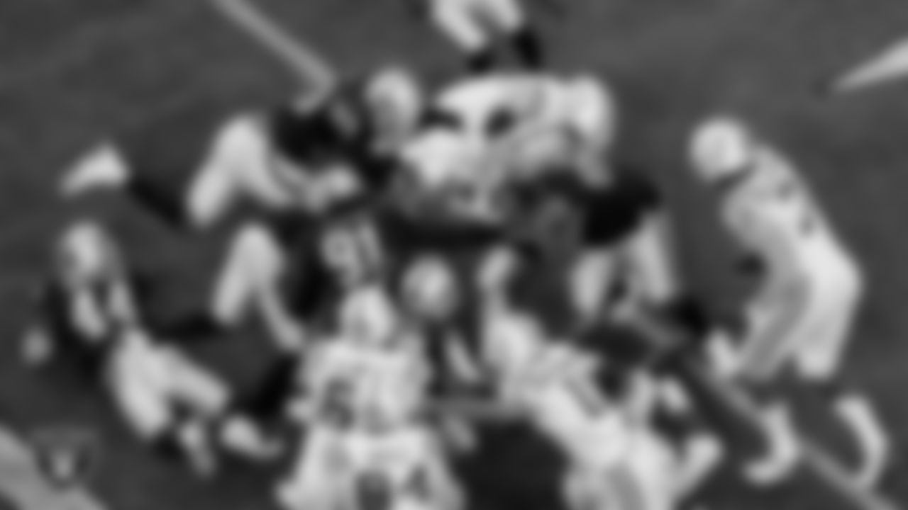 The Raiders defense makes a tackle during the regular season game against the Indianapolis Colts at Allegiant Stadium.