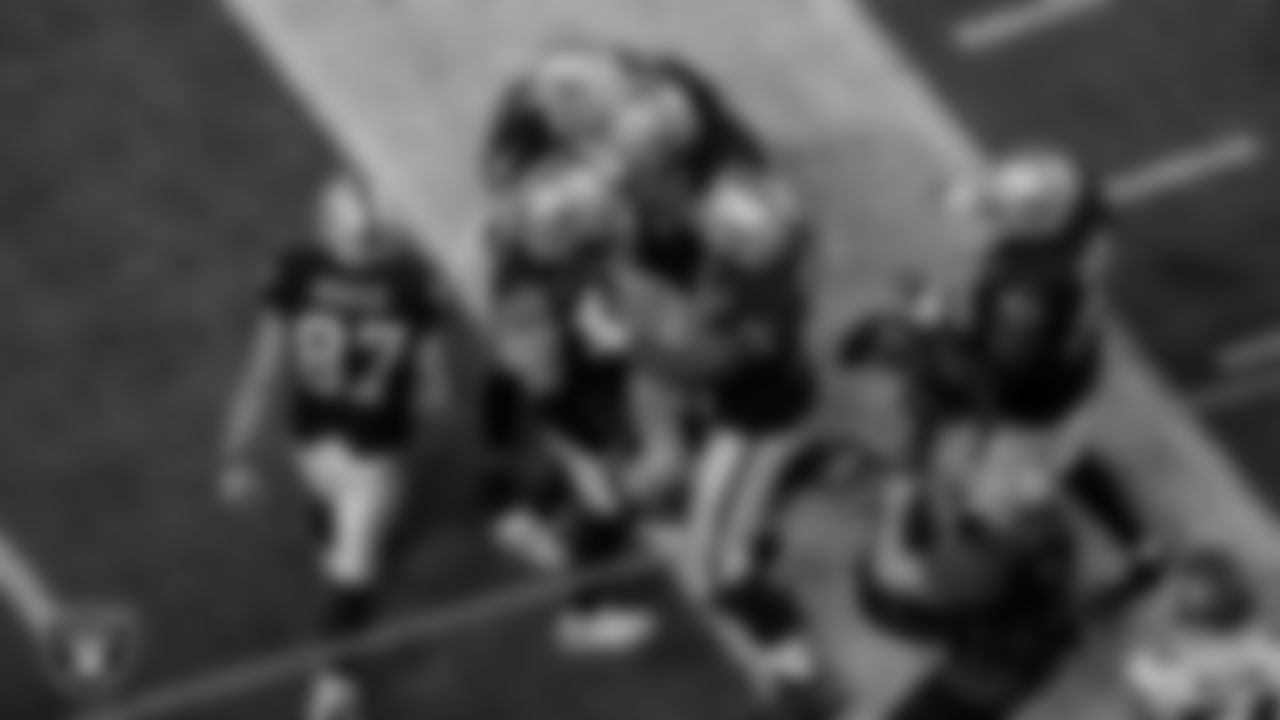 Las Vegas Raiders tight end Jason Witten (82) with teammates after making a 1-yard touchdown catch during the regular season game against the Kansas City Chiefs at Allegiant Stadium.