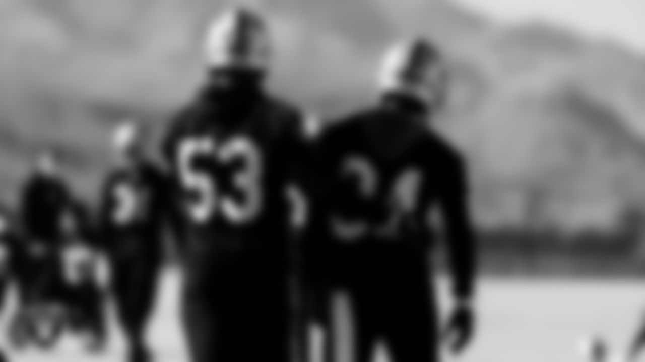 Las Vegas Raiders linebacker Javin White (53) and defensive back Kemah Siverand (34) during practice at Intermountain Healthcare Performance Center.