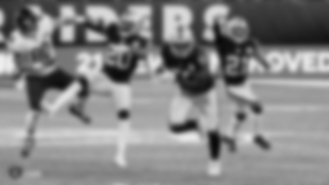 Raiders linebacker Nicholas Morrow (50) runs after making an interception during the game against the Chicago Bears at Tottenham Hotspur Stadium.