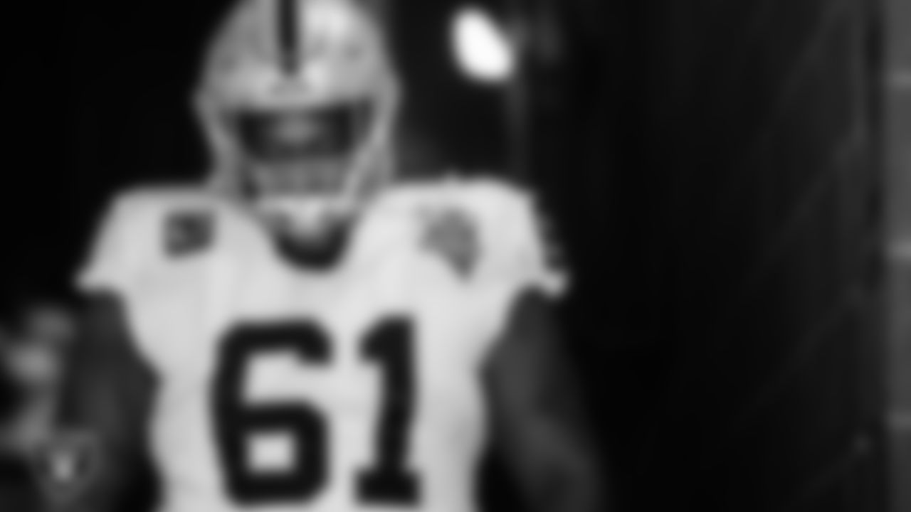 Las Vegas Raiders center Rodney Hudson (61) walks down the tunnel before the regular season away game against the New York Jets.