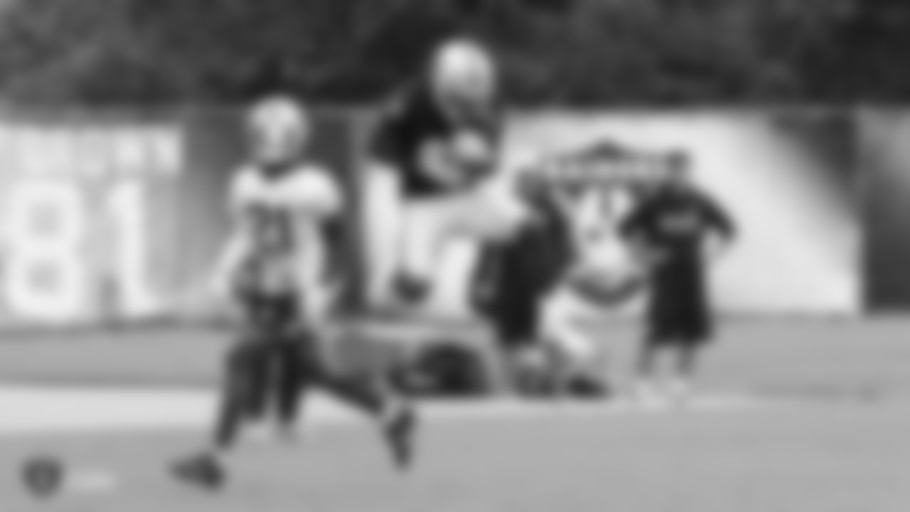 Raiders cornerback Gareon Conley (21) and wide receiver Antonio Brown (84) on the field for a preseason practice.