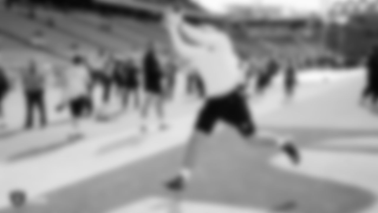 The Raiders warm up before the regular season game against the Los Angeles Chargers at ROKiT Field at Dignity Health Sports Park.