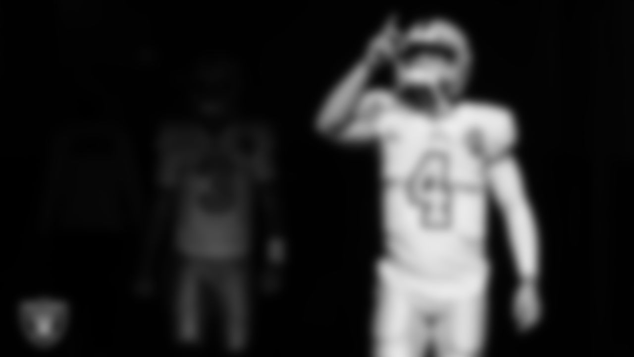 Las Vegas Raiders quarterback Derek Carr (4) walks down the tunnel before the regular season away game against the Los Angeles Chargers.