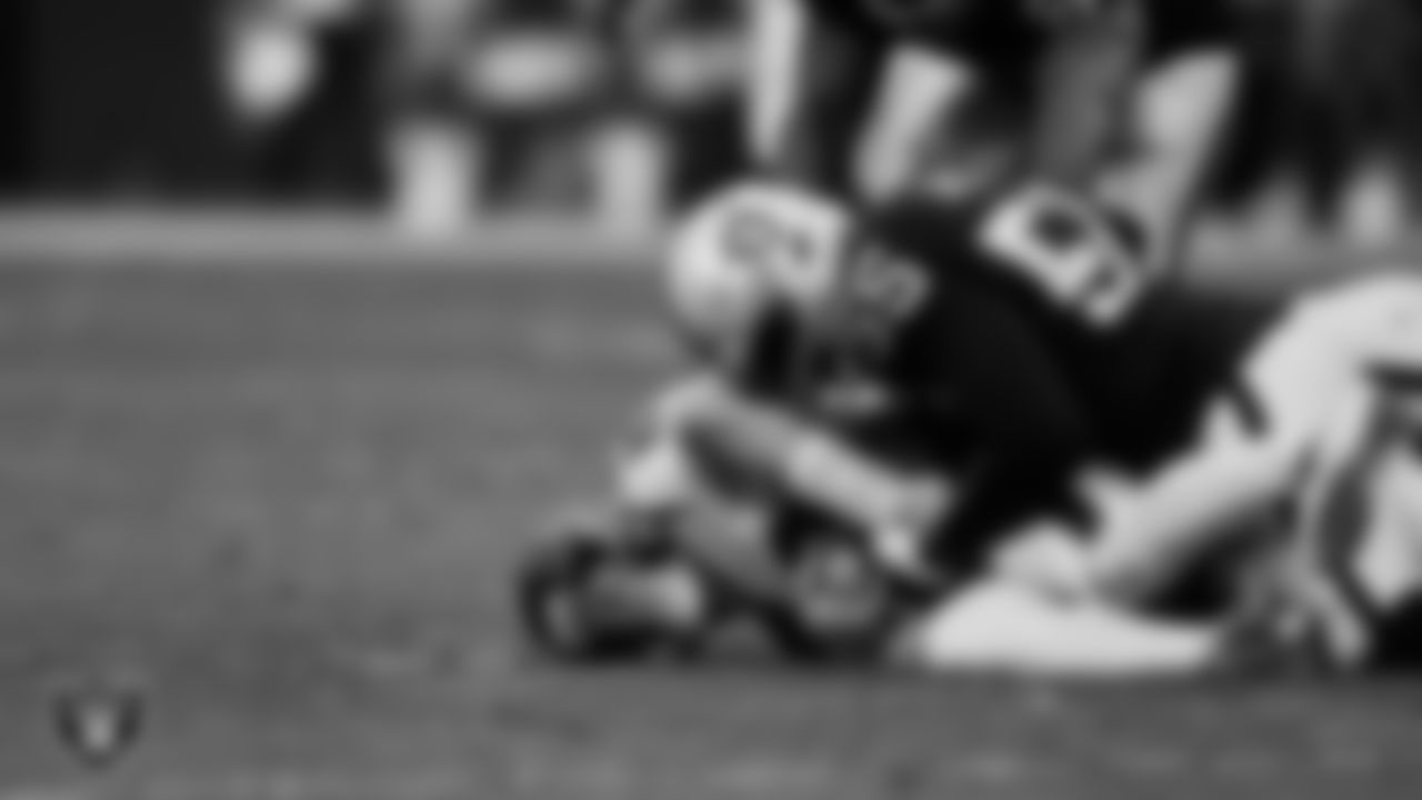 Las Vegas Raiders defensive end Chandler Jones (55) sacks the quarterback during the regular season home game against the Houston Texans at Allegiant Stadium.