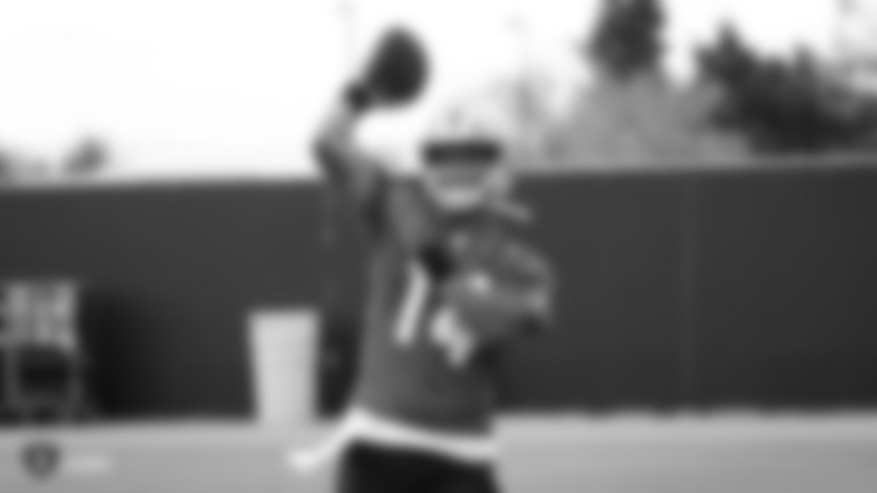 Raiders quarterback DeShone Kizer (14) passes during practice.