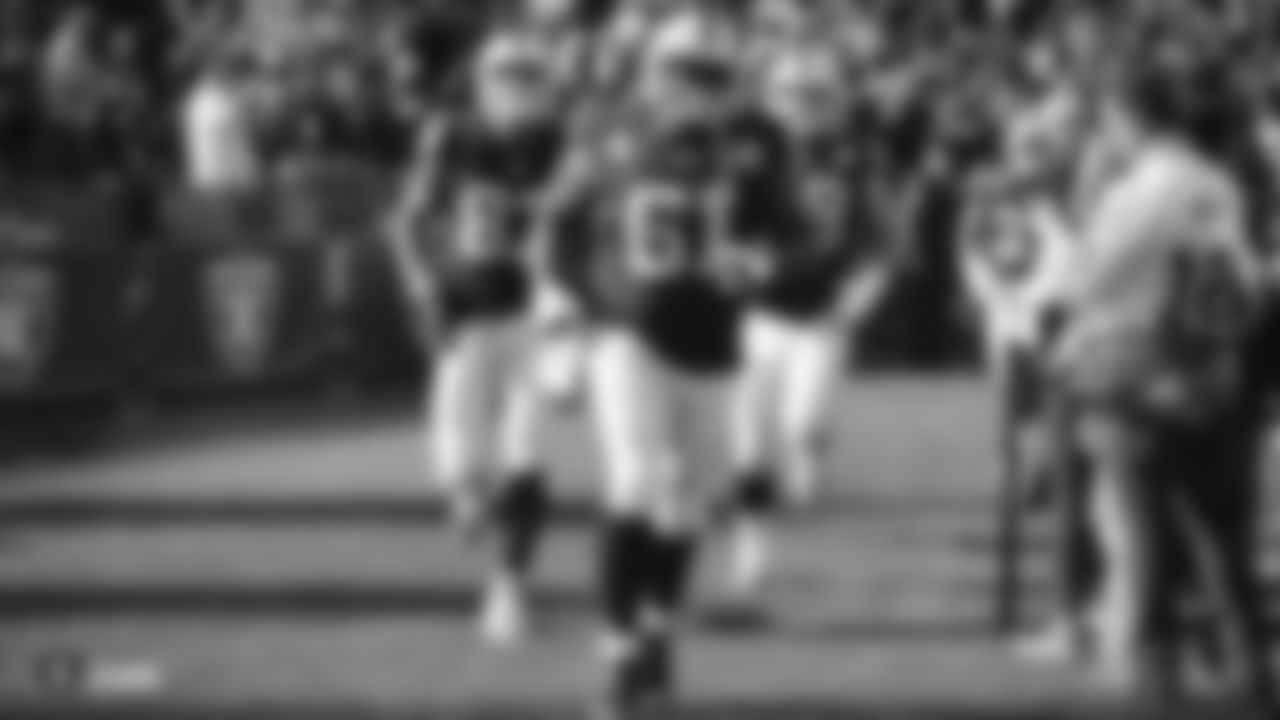 Raiders center Rodney Hudson (61) is introduced onto the field before their regular season game against the Tennessee Titans.
