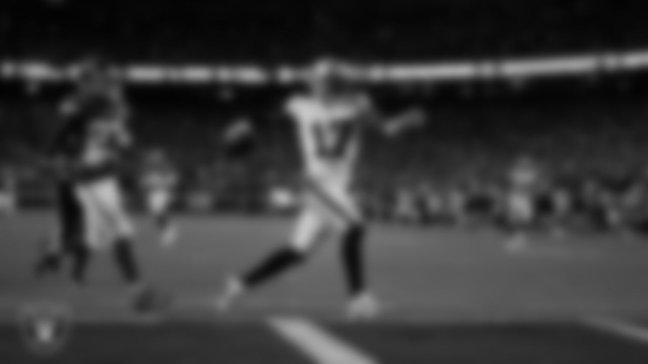 Las Vegas Raiders wide receiver Davante Adams (17) celebrates after making a 58-yard touchdown catch during the regular season away game against the Kansas City Chiefs at GEHA Field at Arrowhead Stadium.