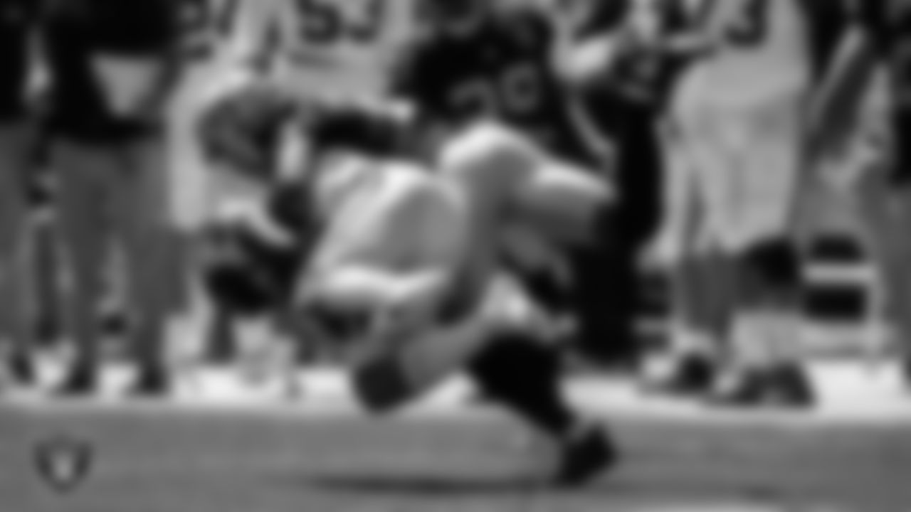 Las Vegas Raiders safety Johnathan Abram (24) makes a tackle during the regular season away game against the Carolina Panthers.