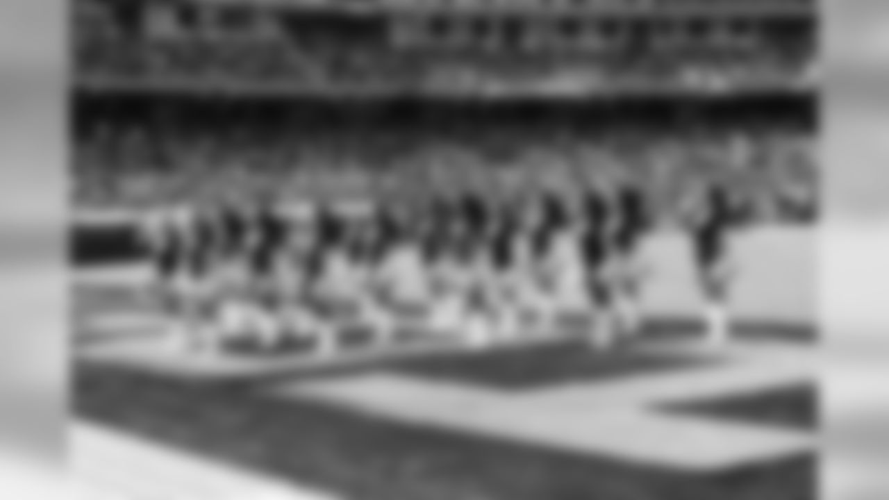The Raiderettes perform in their AL shirts.