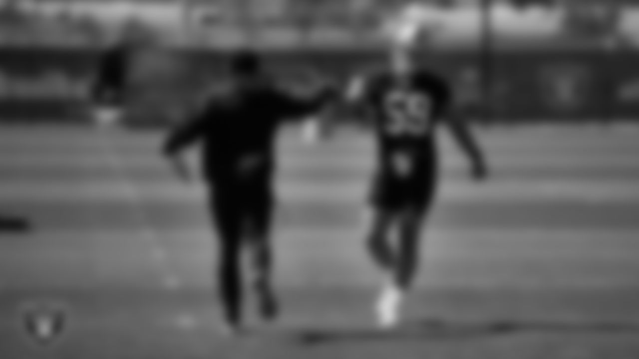 Las Vegas Raiders assistant special teams coach Maurice Drayton and linebacker Luke Masterson (59) during Mandatory Minicamp.