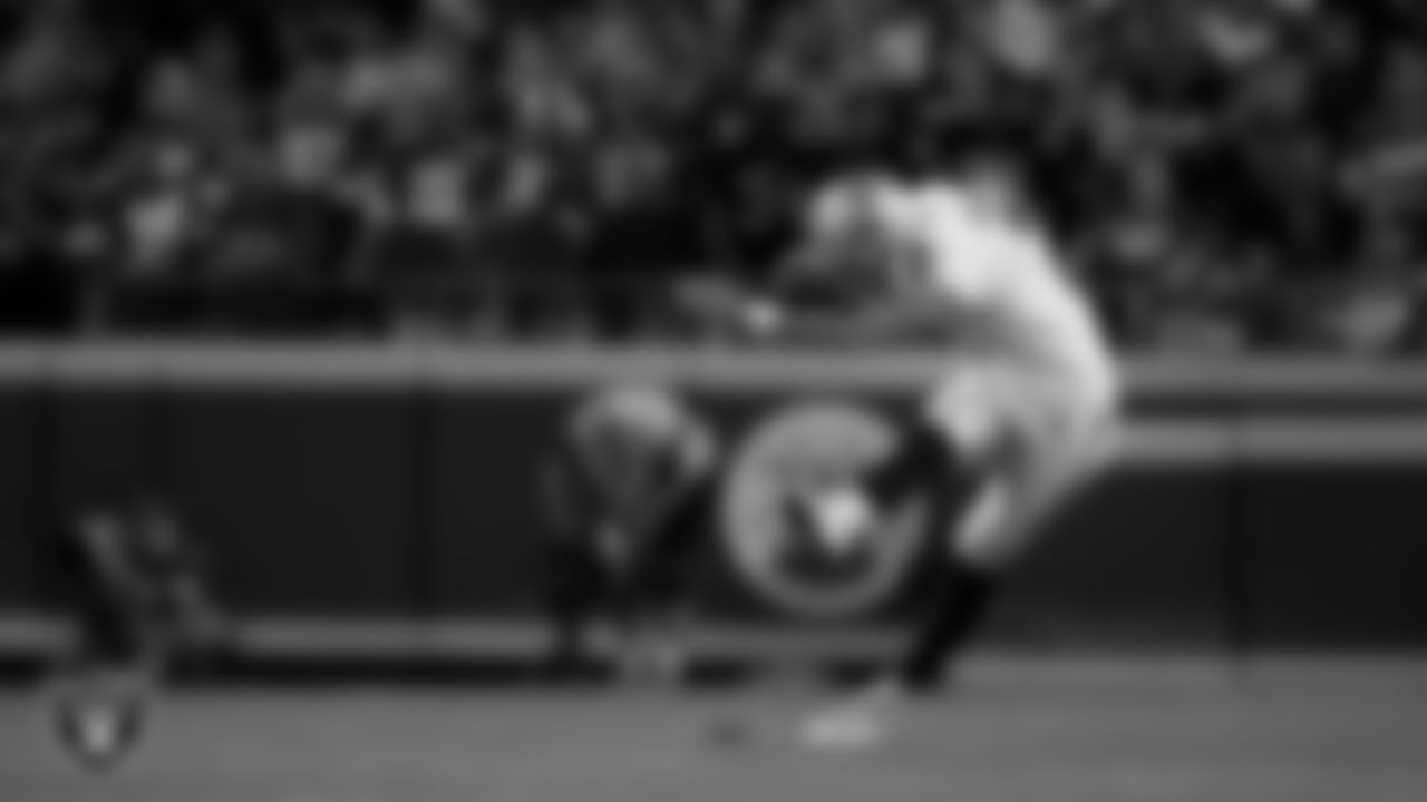 Las Vegas Raiders kicker Daniel Carlson (2) kicks a PAT during the regular season away game against the Kansas City Chiefs at GEHA Field at Arrowhead Stadium.