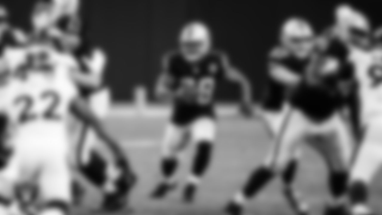 Las Vegas Raiders running back Josh Jacobs (28) rushes during the regular season home game against the Denver Broncos.