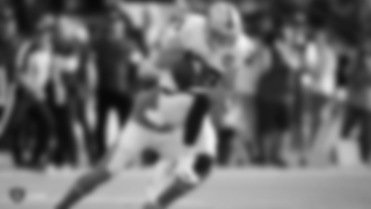 Raiders wide receiver Hunter Renfrow (13) makes a catch and takes it 56 yards for a touchdown during the regular season game against the Los Angeles Chargers at ROKiT Field at Dignity Health Sports Park.