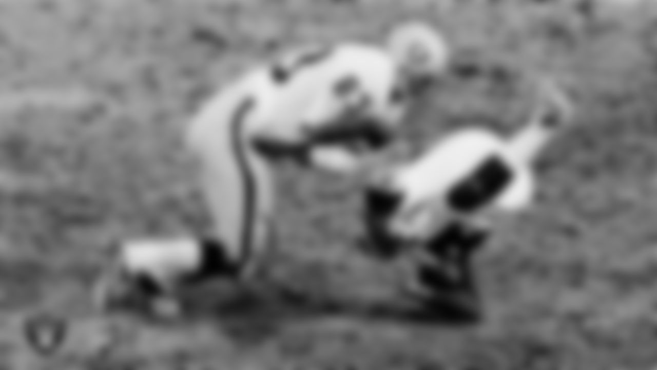 Raiders linebacker Ted Hendricks (83) makes a tackle during the AFC Divisional Round postseason away game against the Baltimore Colts at Memorial Stadium, Saturday, December 24, 1977. The Raiders won 37-31.