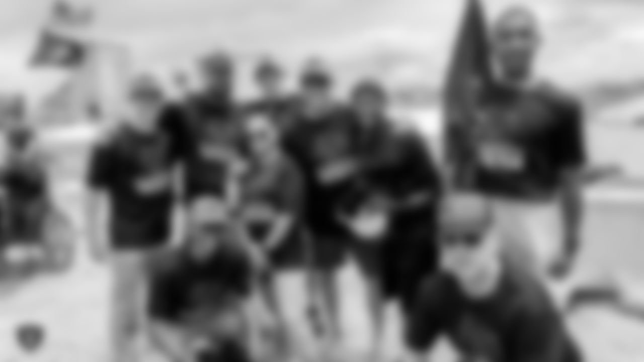 The Southern Nevada Law Enforcement Torch Run partners with the Raiders, represented by alumni Jerry Robinson and Steve Wisniewski, and the Raiderettes, to support Special Olympics Nevada by spending time with its runners and athletes at a fun-filled pit stop along the run.