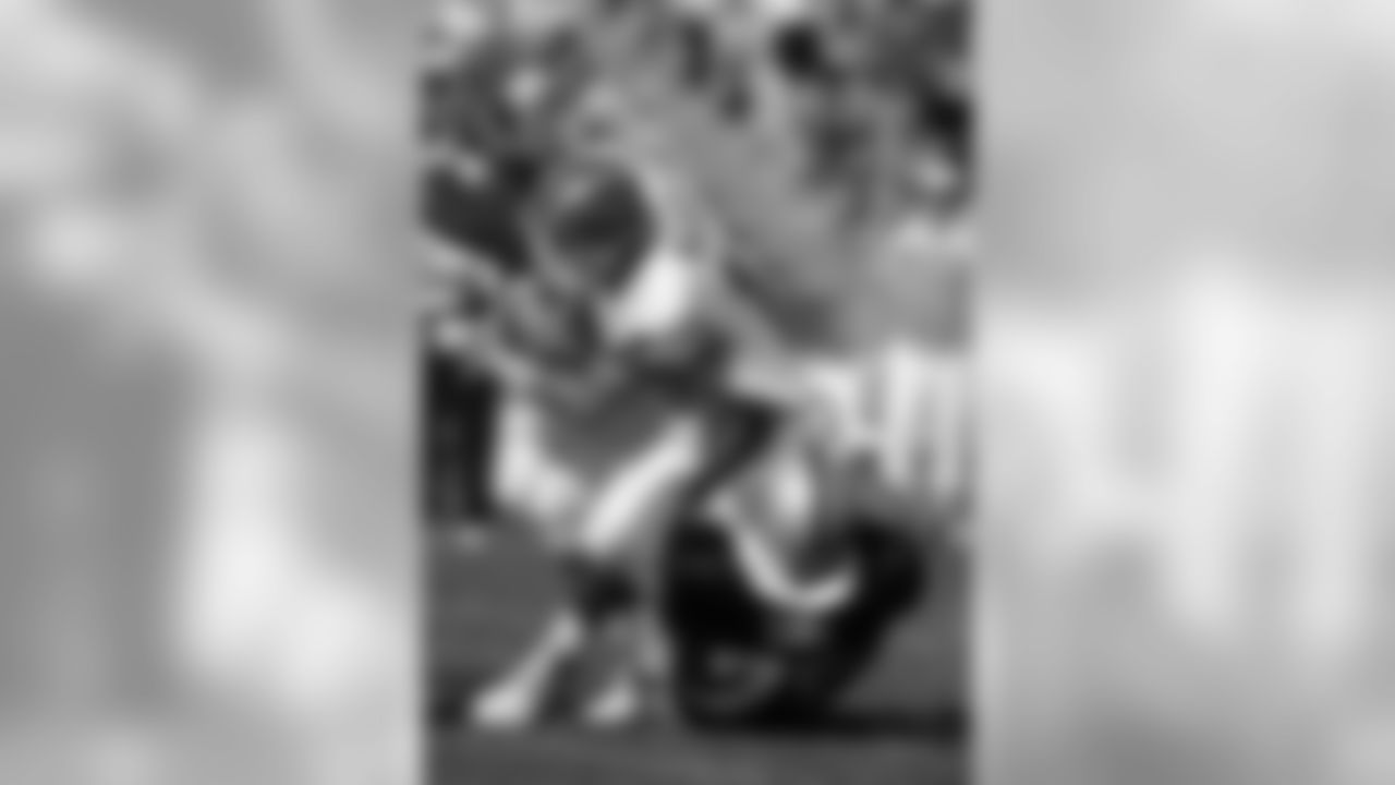 Howie Long brings down Bills QB Jim Kelly in a 1992 match-up.