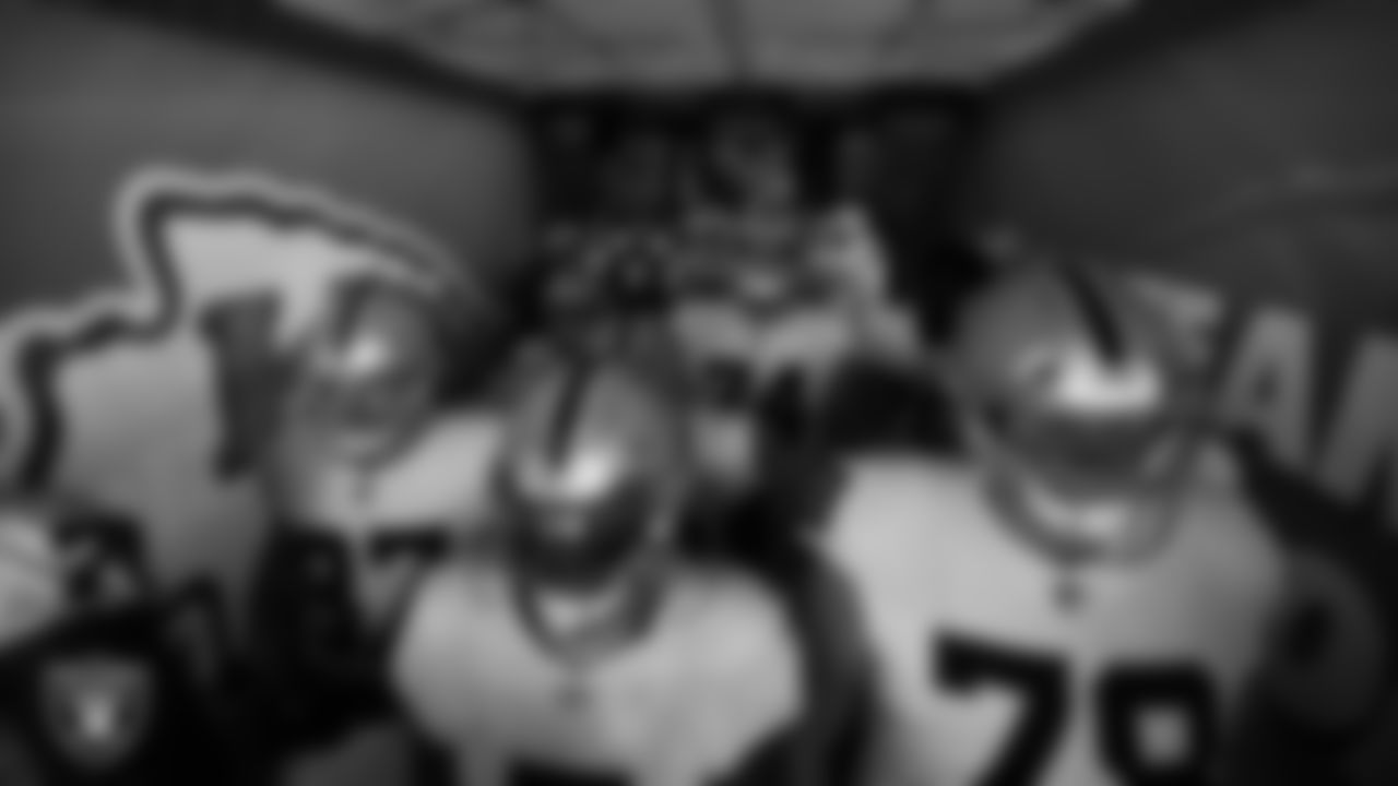 The Las Vegas Raiders wait to be introduced onto the field before the regular season away game against the Kansas City Chiefs.