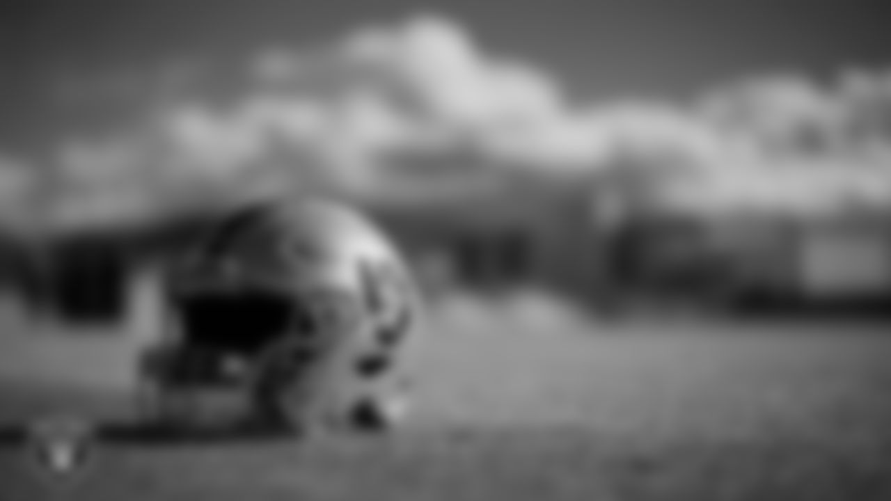 A Las Vegas Raiders helmet on the field during practice at Intermountain Healthcare Performance Center.