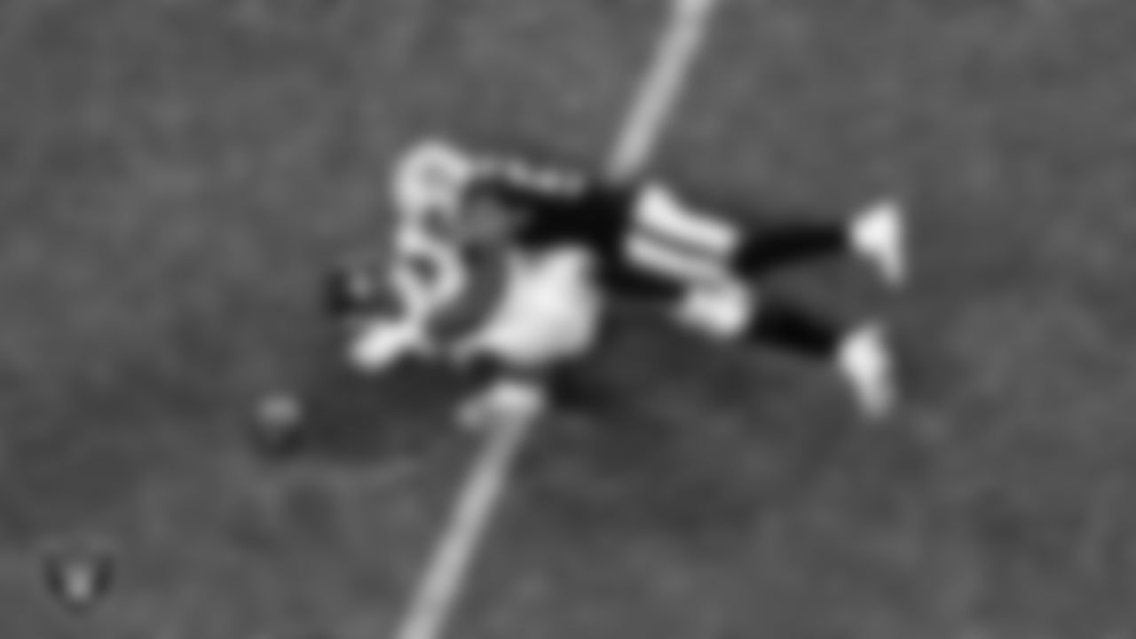 Las Vegas Raiders linebacker Nicholas Morrow (50) breaks up a pass during the regular season home game against the Denver Broncos.