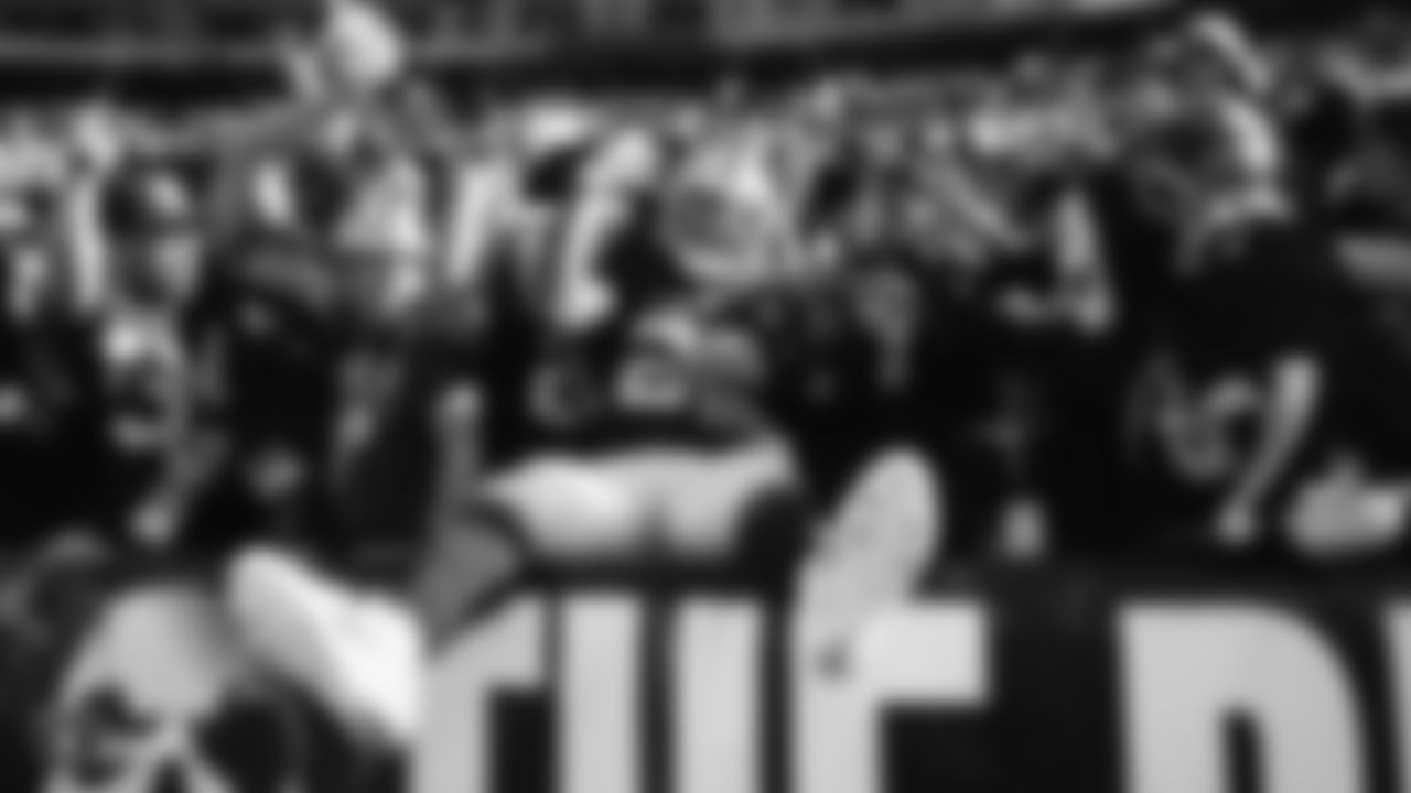 Raiders running back Josh Jacobs (28) leaps into the stands after a 3-yard touchdown run during the regular season game against the Detroit Lions.