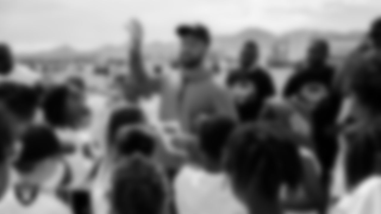 Las Vegas Raiders player personnel assistant JaLun Morris speaks to athletes during C.H.A.M.P. Camp at Intermountain Health Performance Center.
