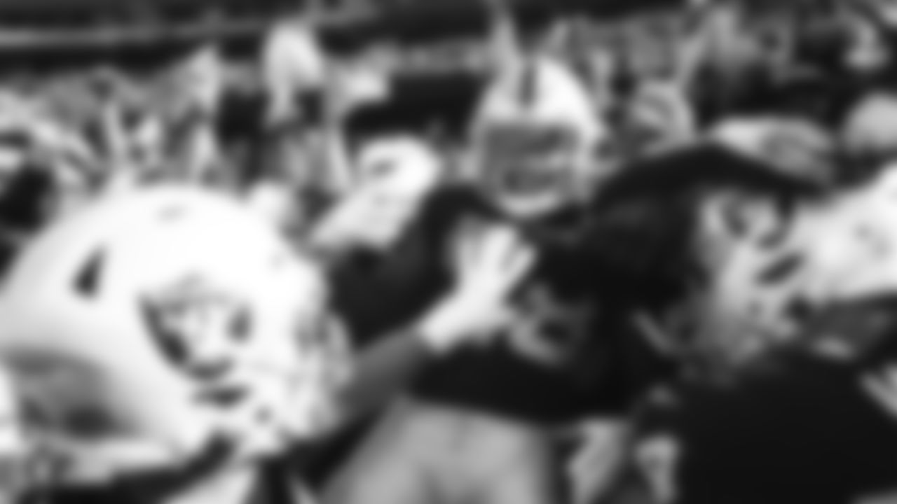 Raiders running back Josh Jacobs (28) celebrates after rushing for a 3-yard touchdown during the regular season game against the Detroit Lions.