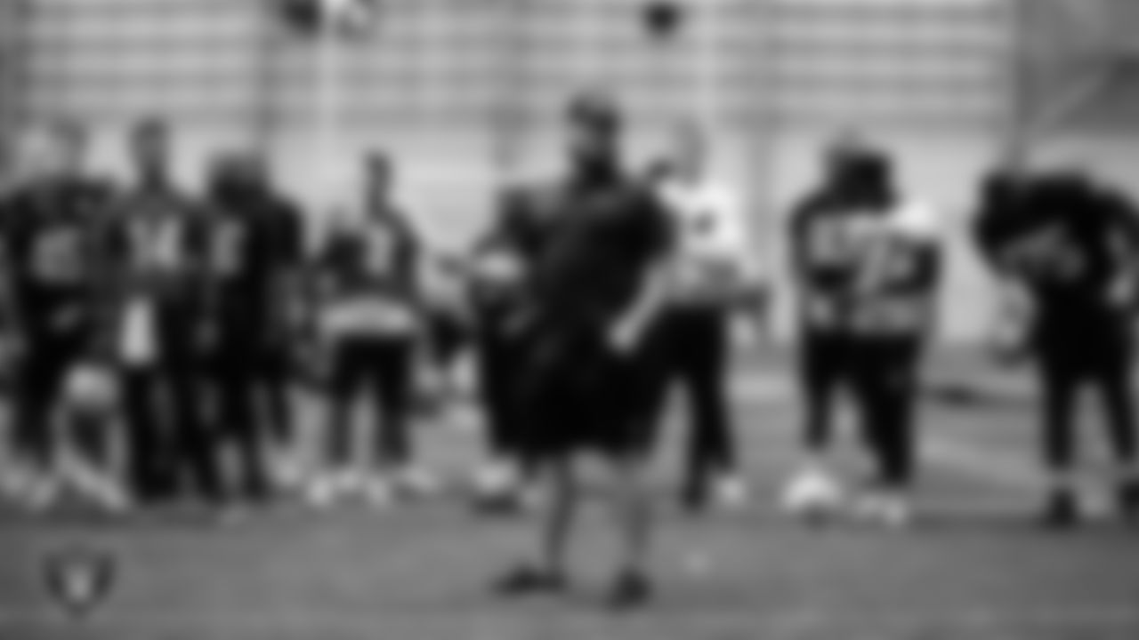 Las Vegas Raiders Head Coach Jon Gruden huddles the team during practice.