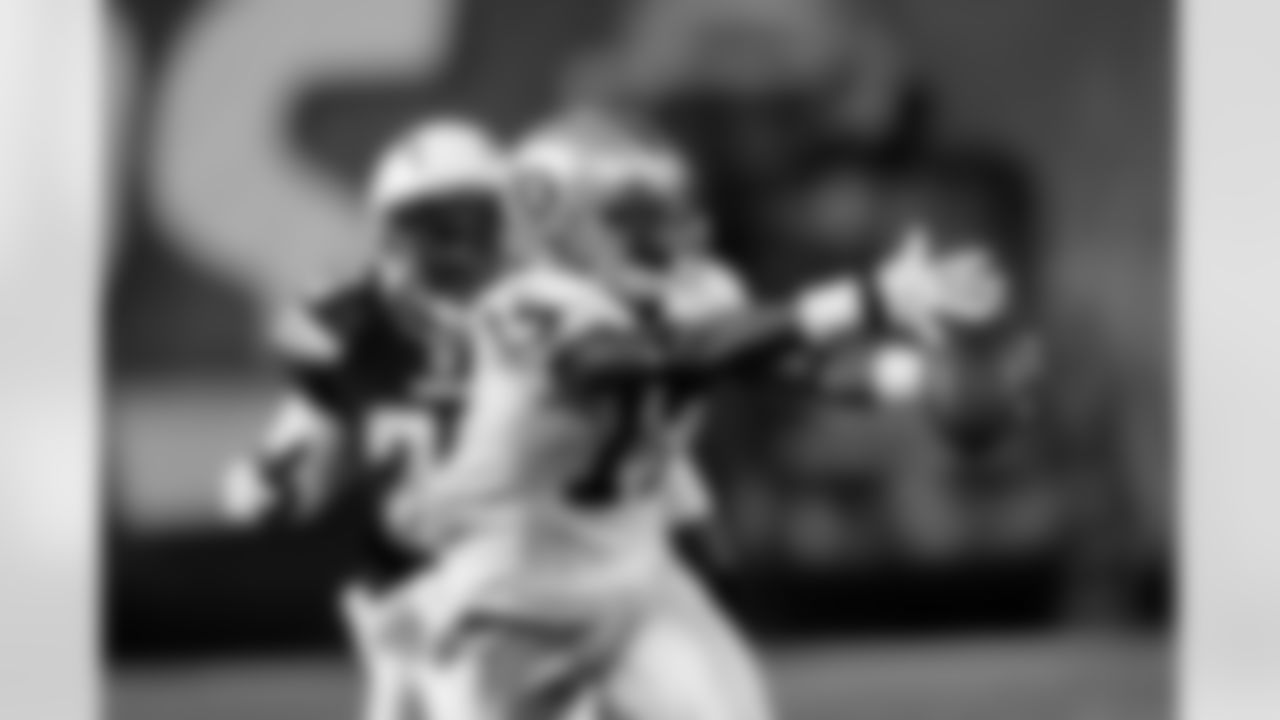 WR Denarius Moore reaches out to make the catch.
