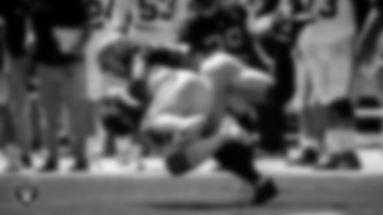 Las Vegas Raiders safety Johnathan Abram (24) makes a tackle during the regular season away game against the Carolina Panthers.