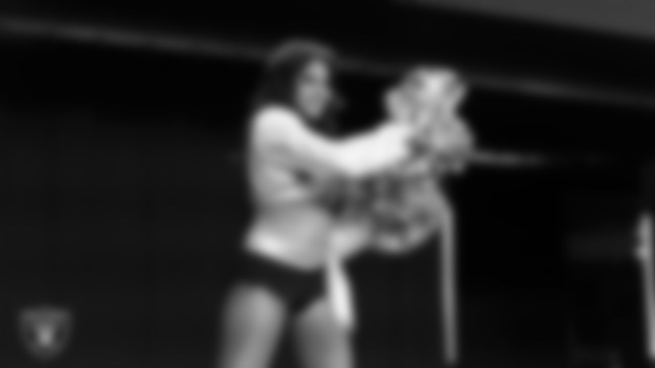 Raiderette Annalise performs during the Season Ticket Member Appreciation Fan Fest at Allegiant Stadium.