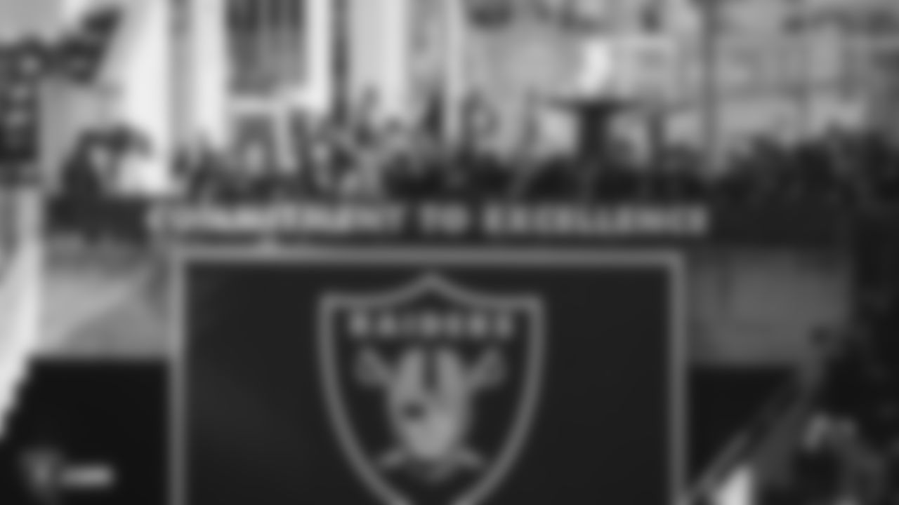 Wives of Raiders alumni from the 1976 AFL Championship season light the Al Davis torch before the Raiders regular season game against the Detroit Lions.