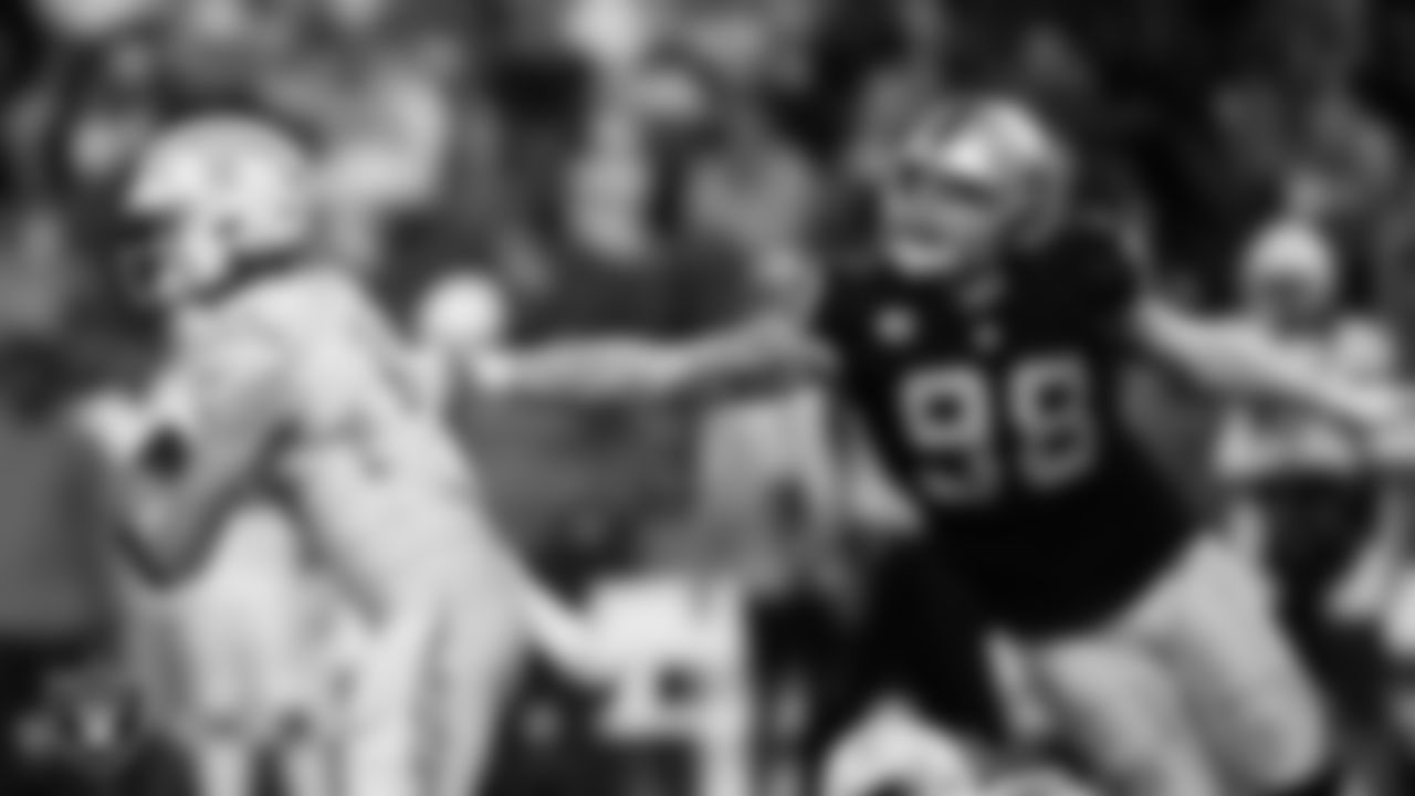 Las Vegas Raiders defensive end Maxx Crosby (98) pressures the quarterback during the regular season home game against the Los Angeles Chargers.
