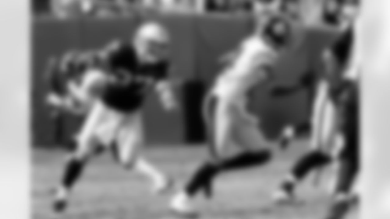 Safety Matt Giordano tracks down the ball carrier.
