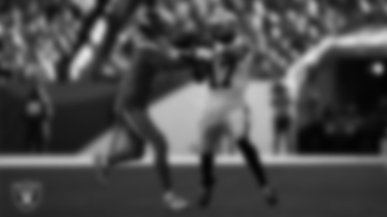 Las Vegas Raiders wide receiver Davante Adams (17) makes a catch during the regular season away game against the Denver Broncos at Empower Field at Mile High.