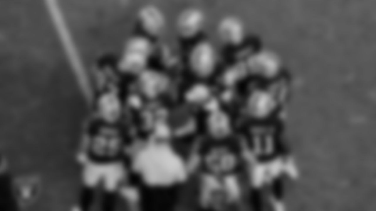 The Las Vegas Raiders special teams huddle during the regular season game against the Kansas City Chiefs at Allegiant Stadium.