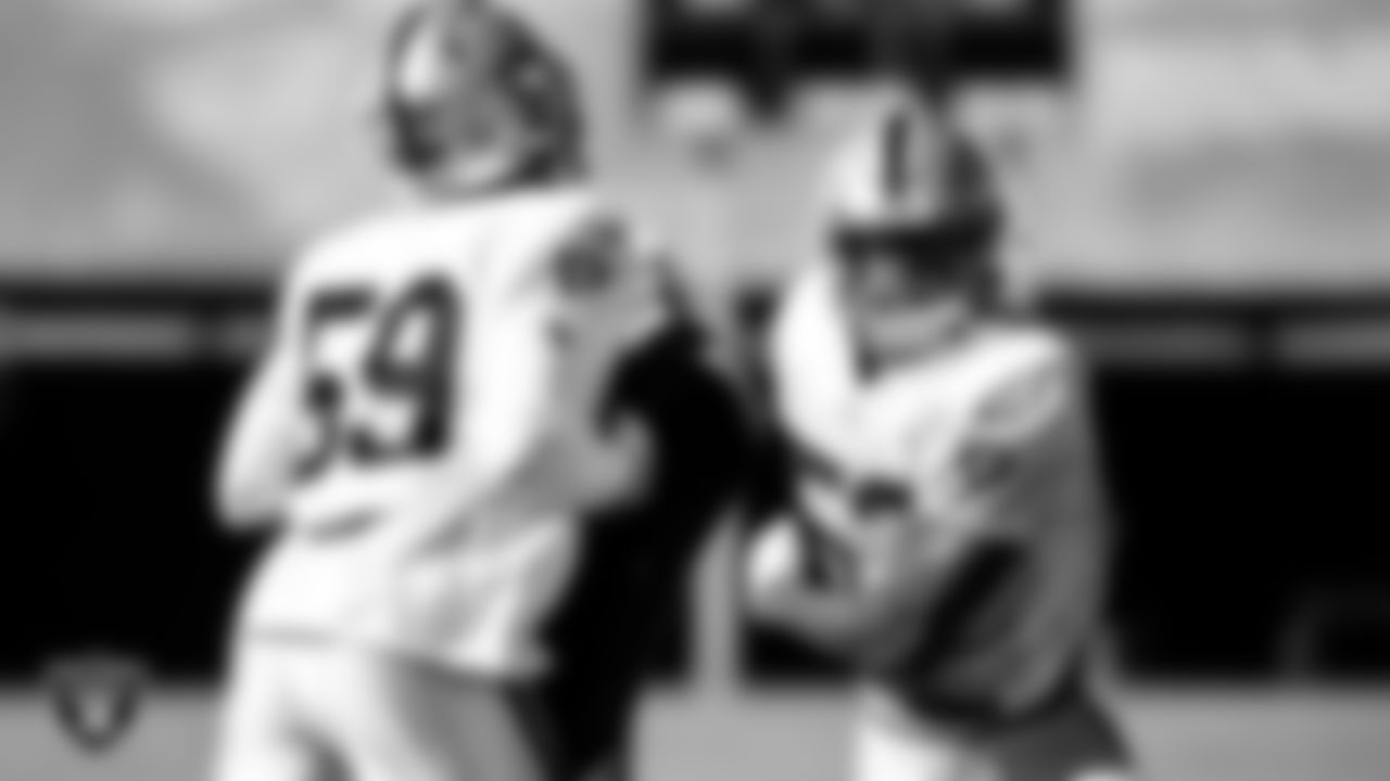 Las Vegas Raiders linebacker James Onwualu (59) and linebacker Javin White (53) during practice.