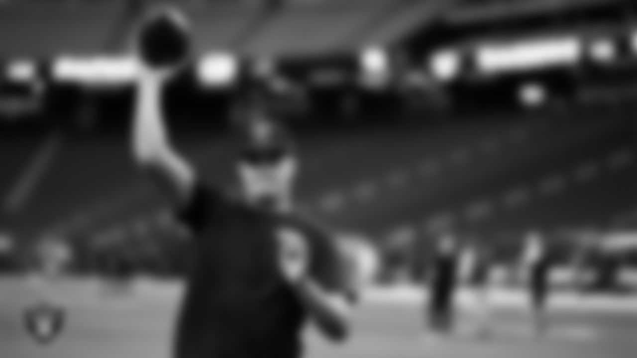 Las Vegas Raiders quarterback Aidan O'Connell (4) warming up before the regular season home game against the Green Bay Packers at Allegiant Stadium.