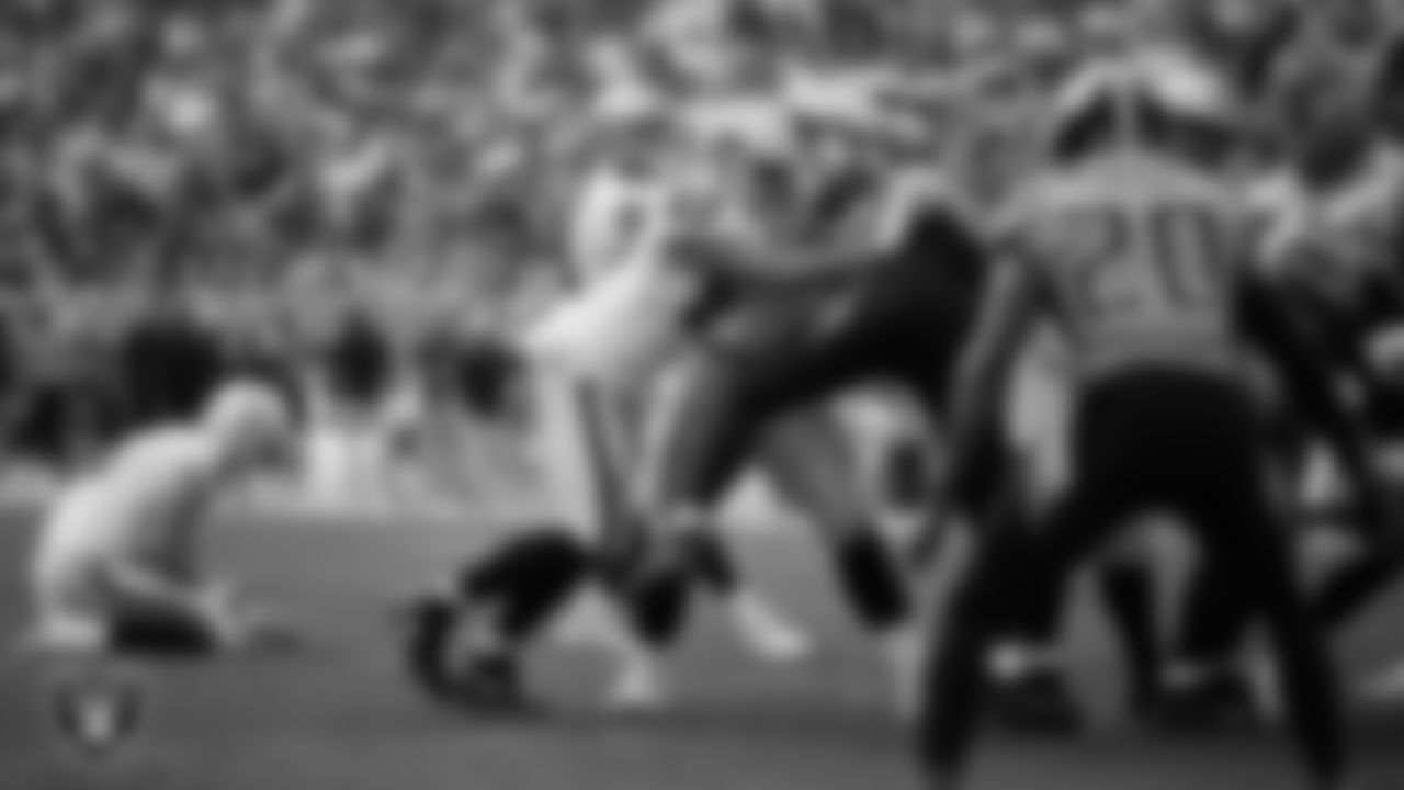 Las Vegas Raiders tight end Foster Moreau (87) blocks on a kick attempt during the regular season away game against the Tennessee Titans at Nissan Stadium.